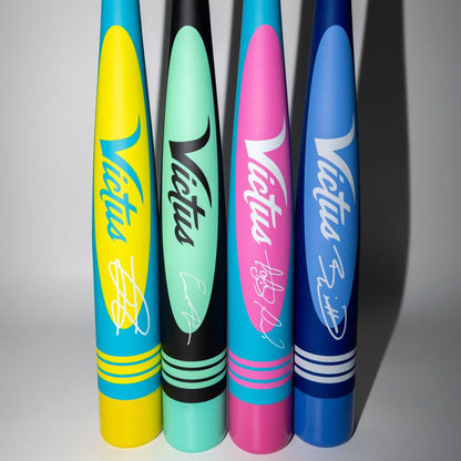 A display of colorful bats features the 2025 Victus Vibe Pro-Crayon Julio Rodriguez (-10) USSSA Bat, a one-piece aluminum bat with a vibration-reducing knob from Victus.