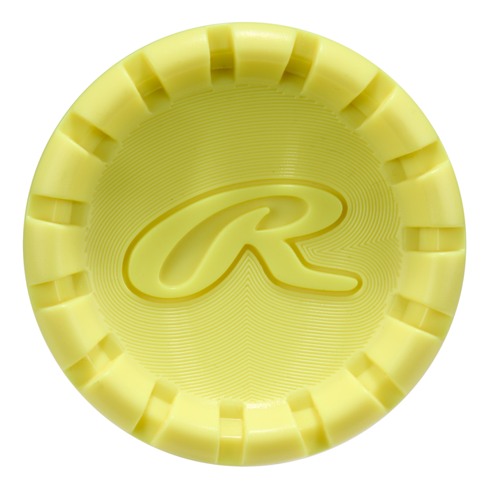 A yellow, circular, textured object with notched edges and a raised “R” at its center—a nod to the 2026 Rawlings Clout AI (-3) BBCOR Baseball Bat: RBB6C3 (DEMO) from Rawlings.