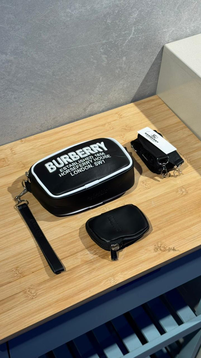 BOLSO CARRIEL MONEDERO BURBERRY NEGRO LETRA BLANCA