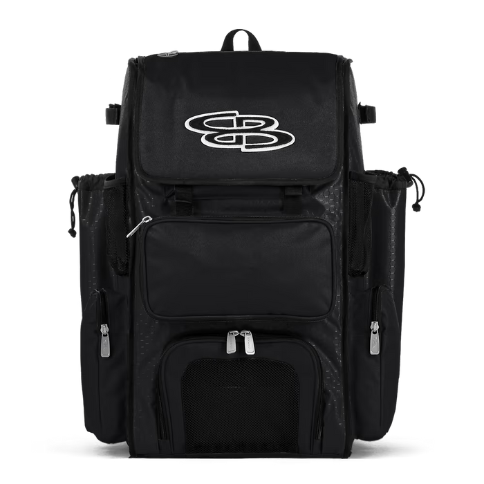 A black Boombah Superpack Bat Bag: BPSP by Boombah, featuring multiple zippered pockets, mesh panels, and a large white logo on the top flap, displayed against a plain white background.
