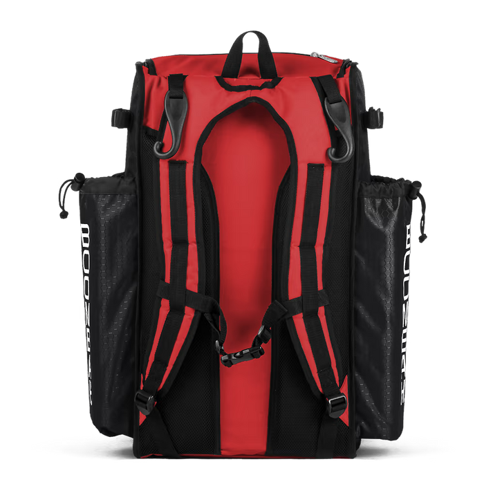 The Boombah Superpack Bat Bag: BPSP by Boombah is a red and black backpack with padded shoulder straps, black mesh side pockets, and a top handle, pictured from the back on a white background.
