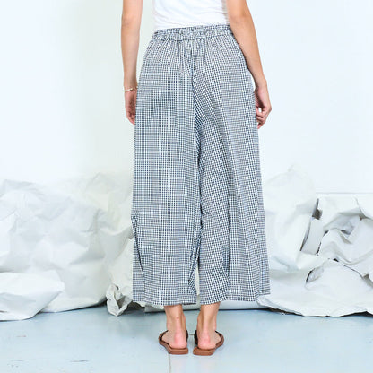 Checked wide-leg trousers with elasticated waist wholesale