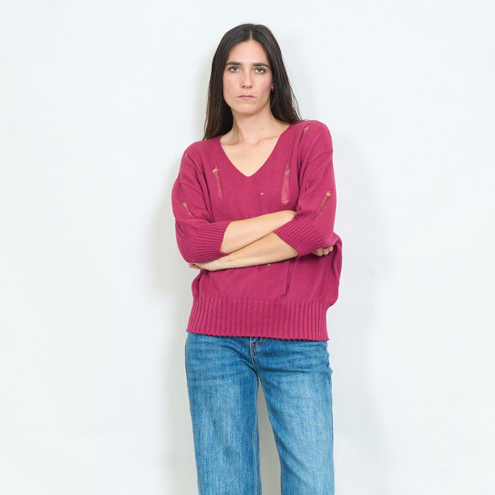 Distressed v-neck knitted sweater with torn details wholesale