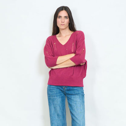 Distressed v-neck knitted sweater with torn details wholesale