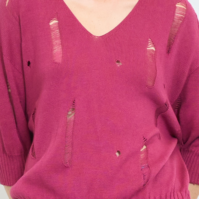Distressed v-neck knitted sweater with torn details wholesale