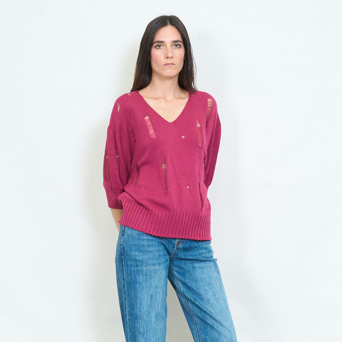 Distressed v-neck knitted sweater with torn details wholesale