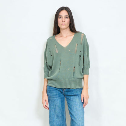 Distressed v-neck knitted sweater with torn details wholesale