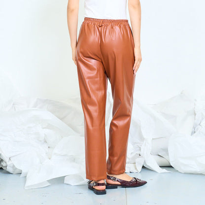 Faux leather straight-leg trousers with pleated front wholesale