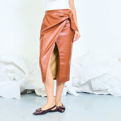 Faux leather wrap midi skirt with side tie wholesale