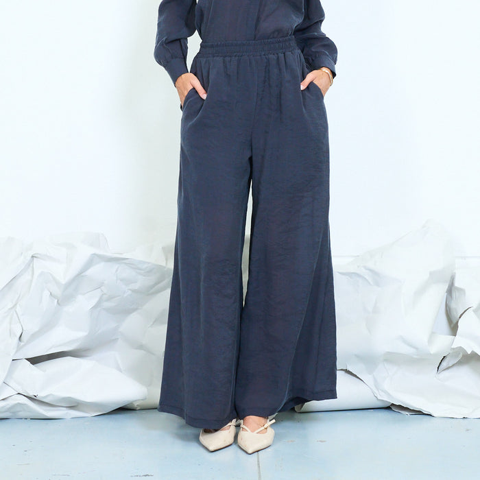 Flowing palazzo trousers with gathered waistband wholesale
