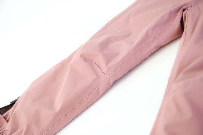 Close-up of waterproof breathable fabric – ash-rose rain pants