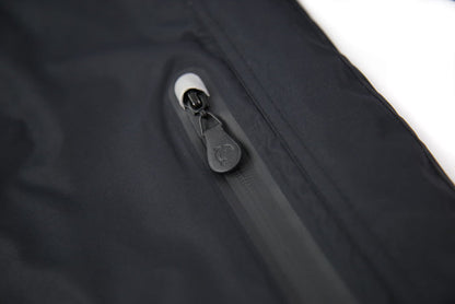 Taped seams and waterproof zipper detail – black insulated jacket
