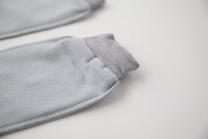 Close-up of grey fleece sock fabric texture – plush and warm
