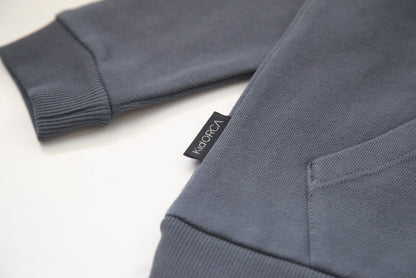 Kangaroo pocket and rib cuff detail on fjord french terry kids hoodie