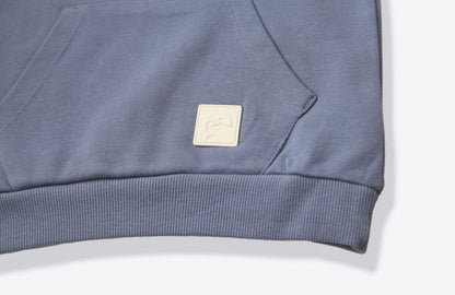 Kangaroo pocket and rib cuff detail on flint french terry kids hoodie