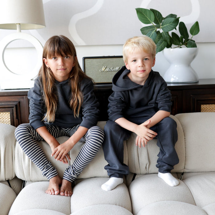 Child wearing lava brushed terry sweatpants – side view with elastic waist