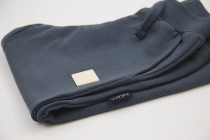 Rib cuff and side pocket detail on fjord blue french terry kids sweatpants