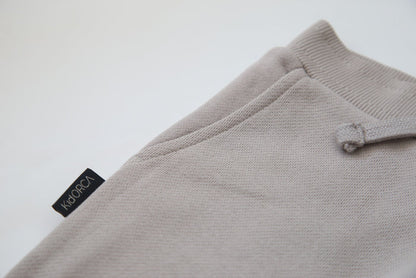 Rib cuff and side pocket detail on pebble grey sweatpants – french terry kids