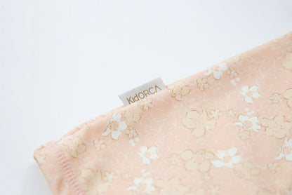 Close-up of stretchy quick-dry fabric – Evangelina Tuscany baby jumpsuit