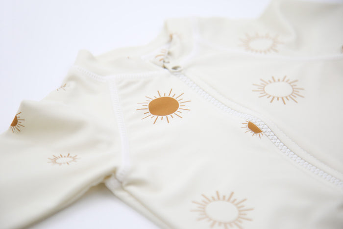 Close‑up of stretchy quick‑dry fabric – Sun Rays Shell baby jumpsuit