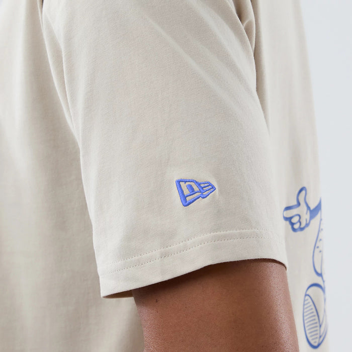 The model is wearing this MLB Food Graphic LA Dodgers Oversized T-Shirt in cream. 6