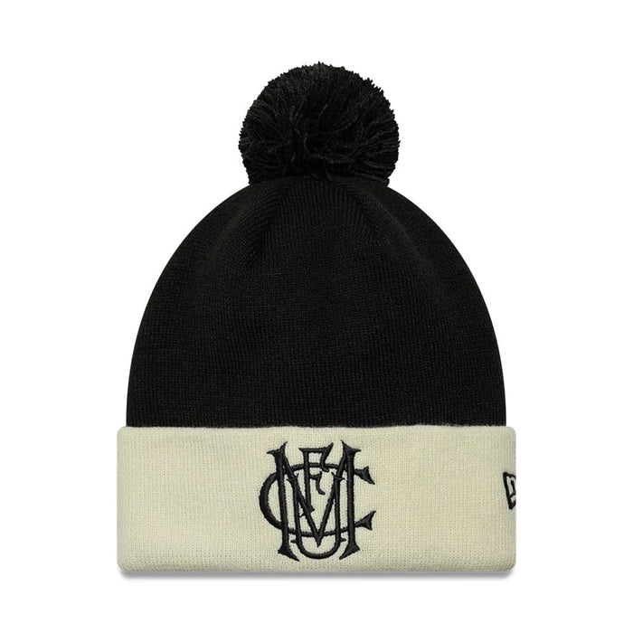 Pictured is this Manchester United FC Monogram Cuff Knit Beanie hat in black. 1