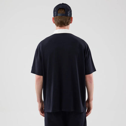 The model is wearing this MLB New York Yankees Polo T-Shirt in navy. 2