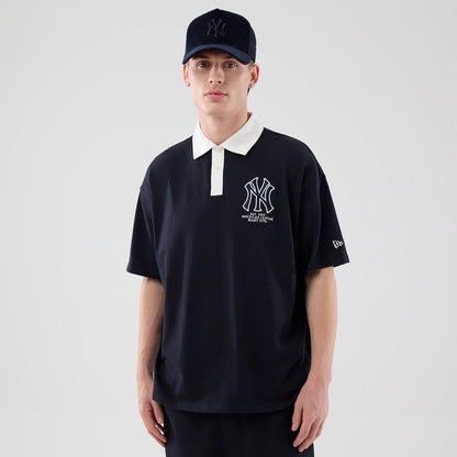 The model is wearing this MLB New York Yankees Polo T-Shirt in navy. 3