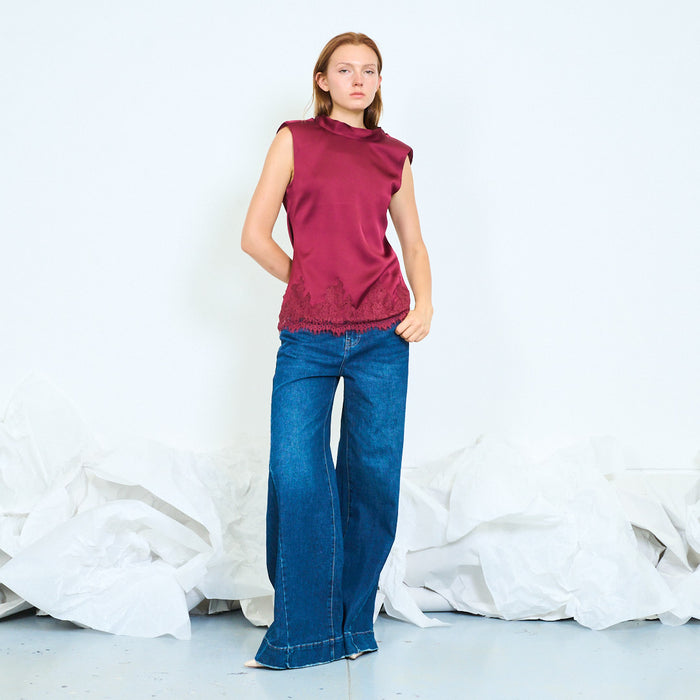 Padded shoulder satin top with lace hem wholesale