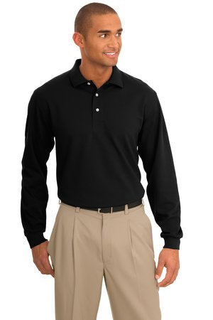 Man modeling black Port Authority Rapid Dry Long Sleeve Polo, designed with moisture-wicking fabric, a three-button placket, and modern silhouette.