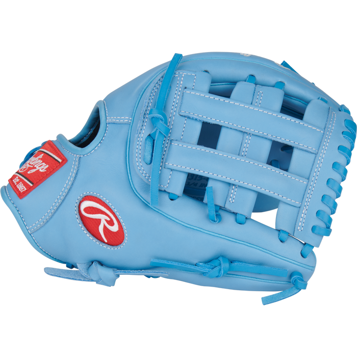 The Rawlings R9 11.75" Baseball Glove (R9315-6CB) is a light blue youth infield glove with a basket web, red logo patches, and blue lacing, shown on a white background.