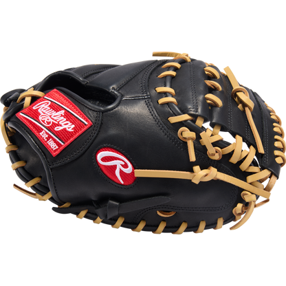 The Rawlings R9 32" ContoUR Baseball Catcher's Mitt (R9CMU-23BC) features a black design with tan laces and red Rawlings logos, shown on a plain white background—ideal for youth players seeking quality and comfort.