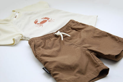 Close-up of UPF 50+ quick-dry recycled polyester – crab rashguard