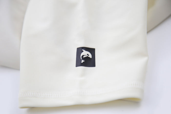 Close-up of UPF 50+ quick-dry recycled polyester – crab rashguard