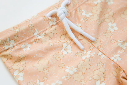 Close-up of quick-dry Tuscany print fabric – Evangelina swim boardie shorts