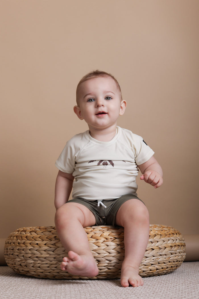 Boy wearing Trout Kalamata boardie shorts – side view with mesh liner