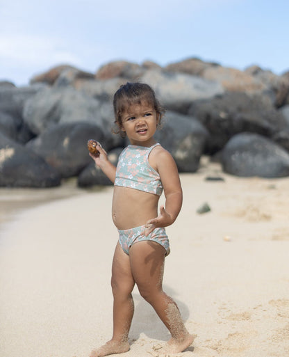 Girl wearing Evangelina sage swim bottom – side view