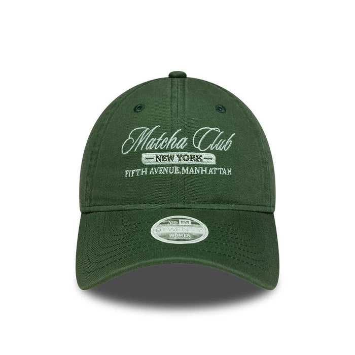 Pictured is this Womens New Era Café Slogan 9TWENTY cap in dark green. 2